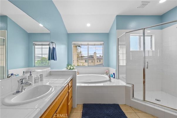 Bathroom, Dual Sink Vanities, Glass Shower, Interior, Recessed Lighting, Tile Countertops