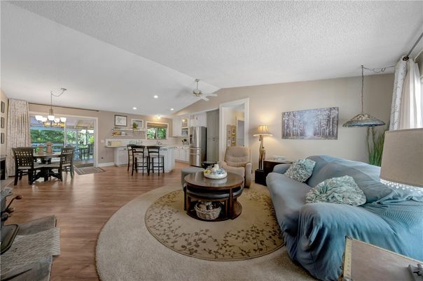 Chandelier, Dining room, Interior, Kitchen, Living room, Pendant Lights, Recessed Lighting, Wood Texture Flooring