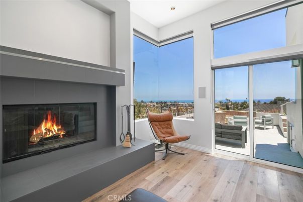Fireplace, Interior, Recessed Lighting, Water, Wood Texture Flooring