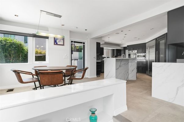 Dining room, Interior, Kitchen, Marble Walls, Pendant Lights, Recessed Lighting, Stainless Steel Appliances