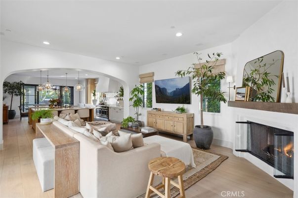 Fireplace, Interior, Kitchen, Living room, Pendant Lights, Recessed Lighting, Stainless Steel Appliances, Wood Texture Flooring