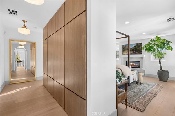 Bedroom, Fireplace, Interior, Pendant Lights, Recessed Lighting, Wood Texture Flooring