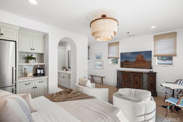 Chandelier, Interior, Kitchen, Living room, Recessed Lighting, Stainless Steel Appliances, Wood Texture Flooring