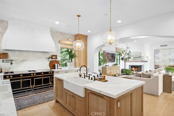 Fireplace, Interior, Kitchen, Living room, Pendant Lights, Recessed Lighting, Stainless Steel Appliances, Wood Texture Flooring