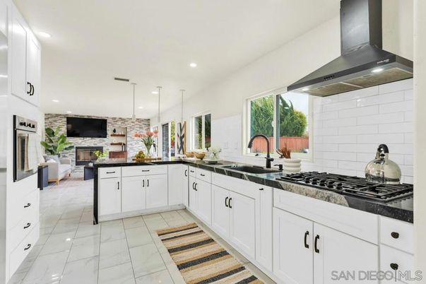 Fireplace, Interior, Kitchen, Marble, Pendant Lights, Recessed Lighting, Stone Walls