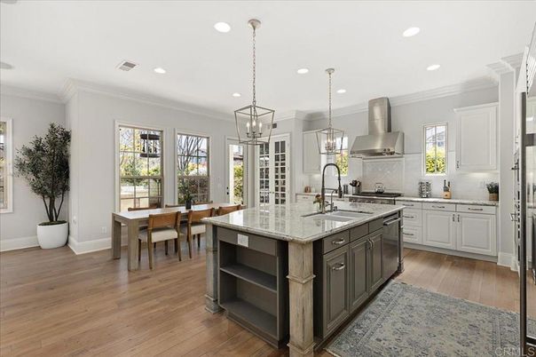 Dining room, Interior, Kitchen, Pendant Lights, Recessed Lighting, Stainless Steel Appliances, Wood Texture Flooring