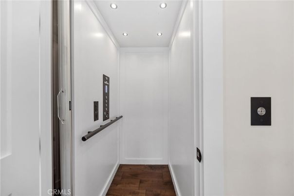 Elevator, Interior, Recessed Lighting, Wood Texture Flooring