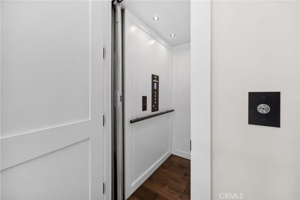 Elevator, Interior, Recessed Lighting, Wood Texture Flooring