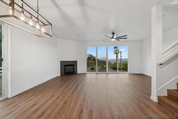 Empty room, Fireplace, Interior, Pendant Lights, Wood Texture Flooring