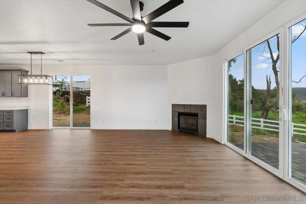 Empty room, Fireplace, Interior, Pendant Lights, Wood Texture Flooring