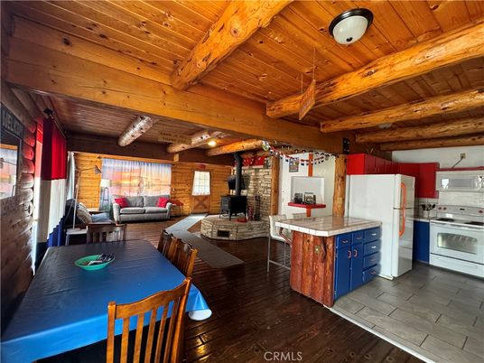 Dining room, Fireplace, Interior, Kitchen, Living room, Stone Walls, Tile Countertops, Wooden Beams, Wooden Ceilings, Wood Texture Flooring