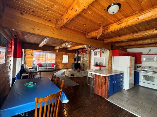 Dining room, Fireplace, Interior, Kitchen, Living room, Stone Walls, Tile Countertops, Wooden Beams, Wooden Ceilings, Wood Texture Flooring