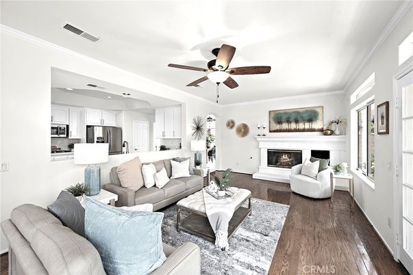 Fireplace, Interior, Kitchen, Living room, Recessed Lighting, Stainless Steel Appliances, Wood Texture Flooring