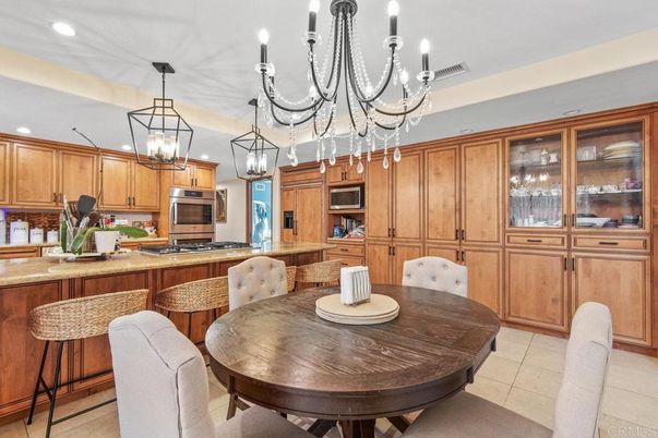 Chandelier, Dining room, Interior, Kitchen, Pendant Lights, Recessed Lighting, Stainless Steel Appliances
