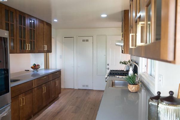 Interior, Kitchen, Recessed Lighting, Stainless Steel Appliances, Wood Texture Flooring