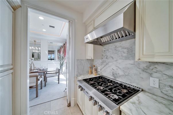 Chandelier, Dining room, Interior, Kitchen, Marble Walls, Recessed Lighting, Stainless Steel Appliances