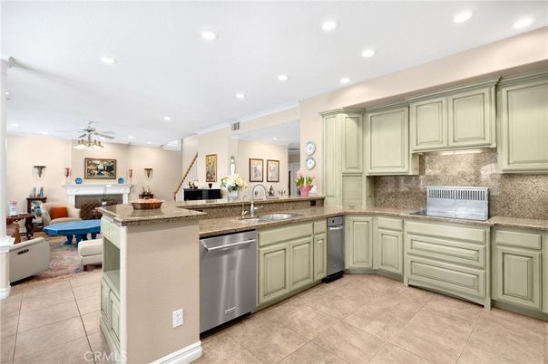 Fireplace, Interior, Kitchen, Living room, Recessed Lighting, Stainless Steel Appliances
