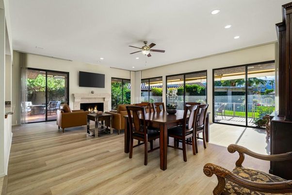 Dining room, Fireplace, Interior, Living room, Recessed Lighting, Wood Texture Flooring