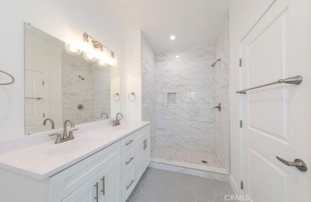 Bathroom, Dual Sink Vanities, Glass Shower, Interior, Marble Walls, Recessed Lighting