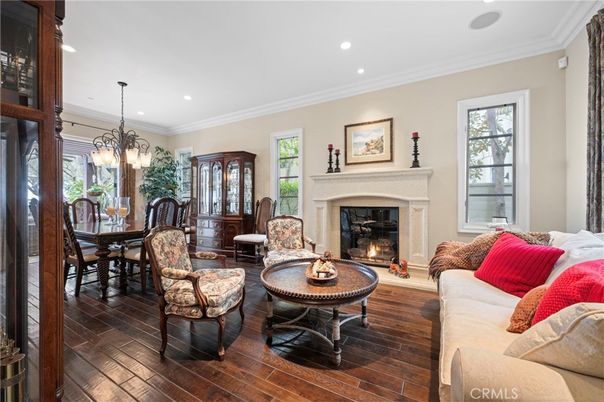 Dining room, Fireplace, Interior, Living room, Pendant Lights, Recessed Lighting, Wood Texture Flooring