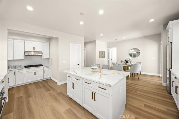 Dining room, Interior, Kitchen, Recessed Lighting, Stainless Steel Appliances, Wood Texture Flooring