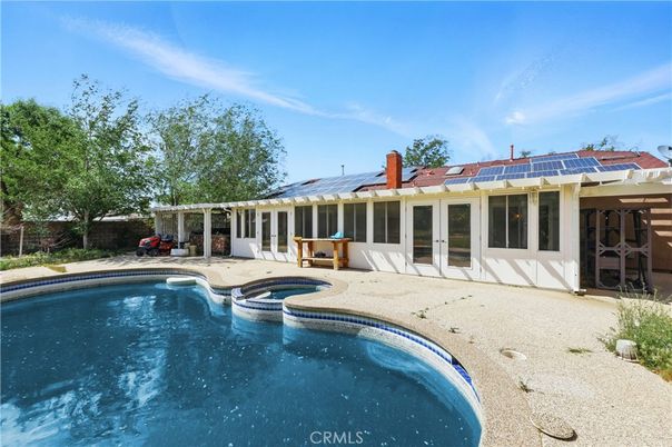 Exterior, Pool, Solar Panels