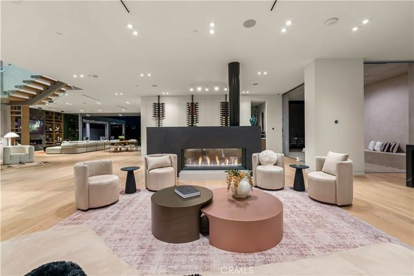Dining room, Fireplace, Interior, Living room, Recessed Lighting, Wood Texture Flooring