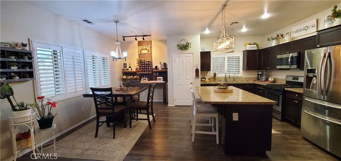 Dining room, Interior, Kitchen, Pendant Lights, Recessed Lighting, Stainless Steel Appliances, Wood Texture Flooring