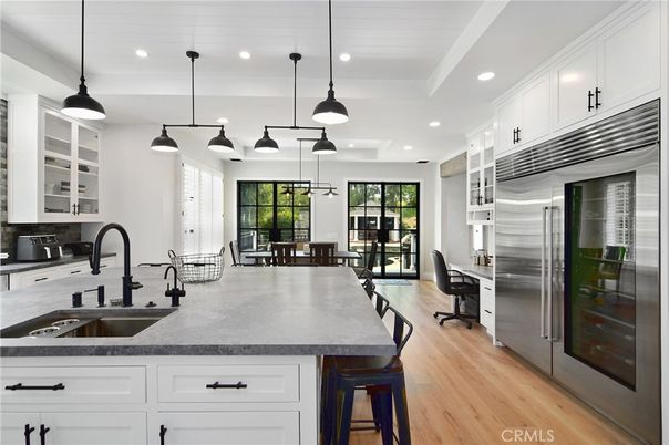 Dining room, Interior, Kitchen, Pendant Lights, Recessed Lighting, Stainless Steel Appliances, Wood Texture Flooring