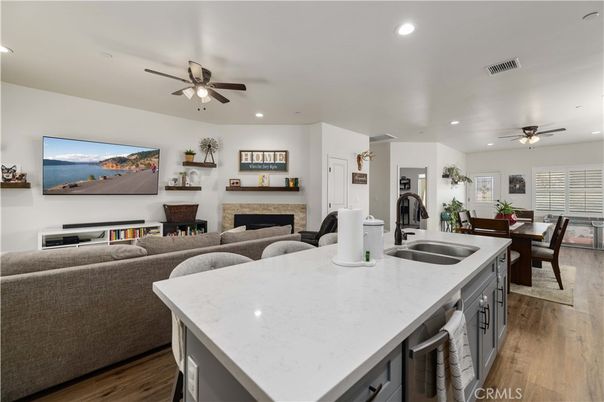 Dining room, Fireplace, Interior, Kitchen, Living room, Recessed Lighting, Wood Texture Flooring
