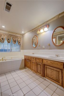 Bathroom, Dual Sink Vanities, Interior, Recessed Lighting, Tile Countertops