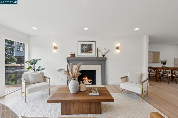 Dining room, Fireplace, Interior, Living room, Recessed Lighting, Wood Texture Flooring