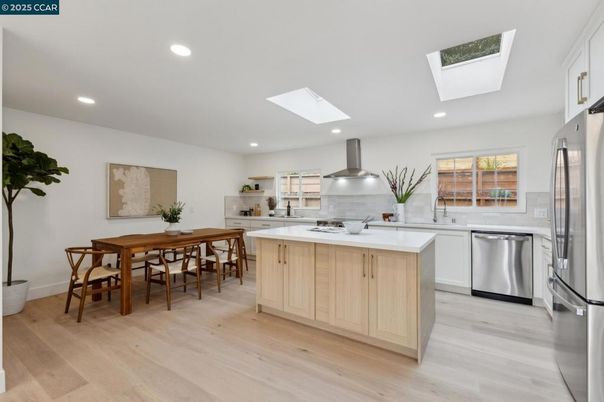 Dining room, Interior, Kitchen, Recessed Lighting, Stainless Steel Appliances, Wood Texture Flooring