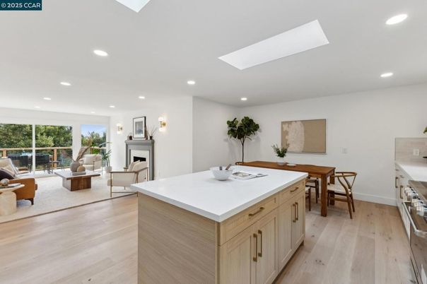 Dining room, Fireplace, Interior, Kitchen, Living room, Recessed Lighting, Wood Texture Flooring