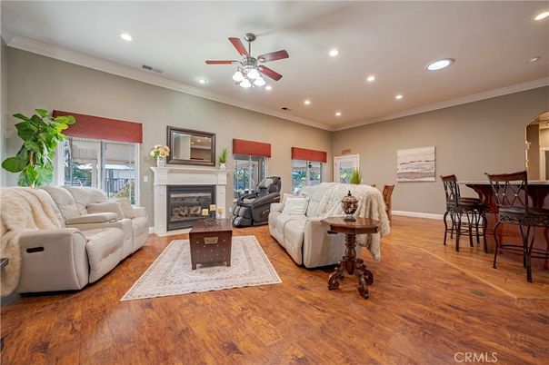 Dining room, Fireplace, Interior, Living room, Recessed Lighting, Wood Texture Flooring