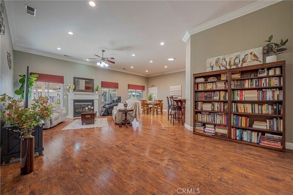 Dining room, Fireplace, Interior, Living room, Recessed Lighting, Wood Texture Flooring