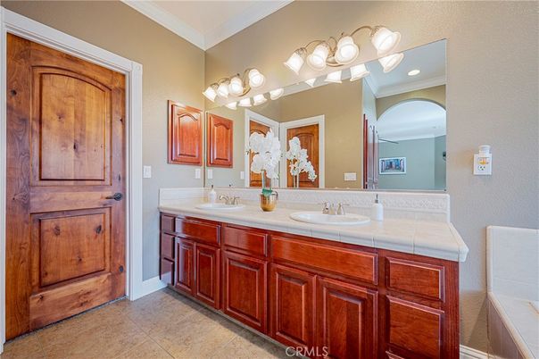 Bathroom, Dual Sink Vanities, Interior, Recessed Lighting, Tile Countertops