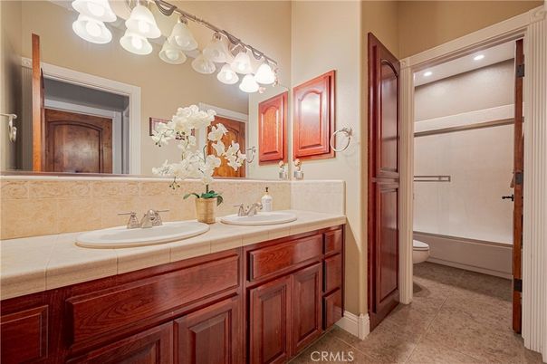 Bathroom, Dual Sink Vanities, Interior, Recessed Lighting, Tile Countertops