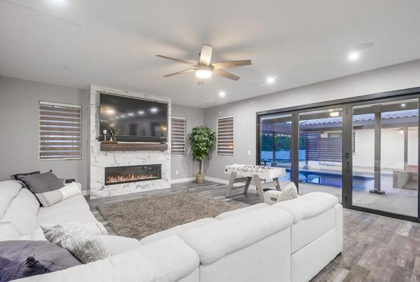 Fireplace, Interior, Living room, Recessed Lighting, Wood Texture Flooring