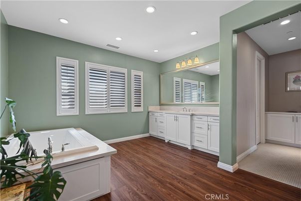 Bathroom, Dual Sink Vanities, Interior, Recessed Lighting, Wood Texture Flooring