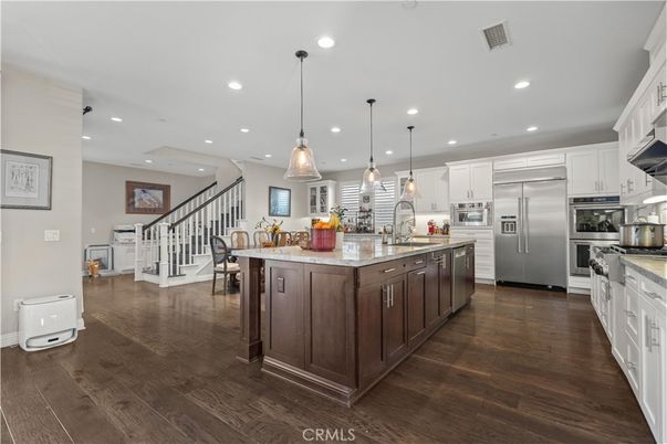 Interior, Kitchen, Pendant Lights, Recessed Lighting, Stainless Steel Appliances, Wood Texture Flooring