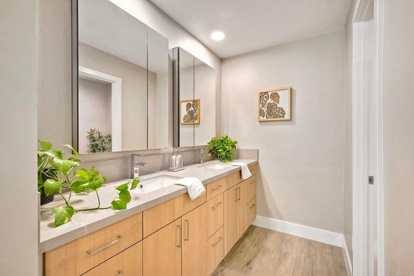 Bathroom, Dual Sink Vanities, Interior, Recessed Lighting, Wood Texture Flooring