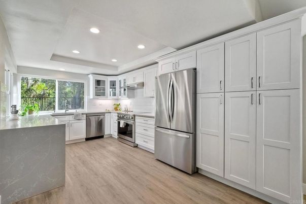 Interior, Kitchen, Recessed Lighting, Stainless Steel Appliances, Wood Texture Flooring