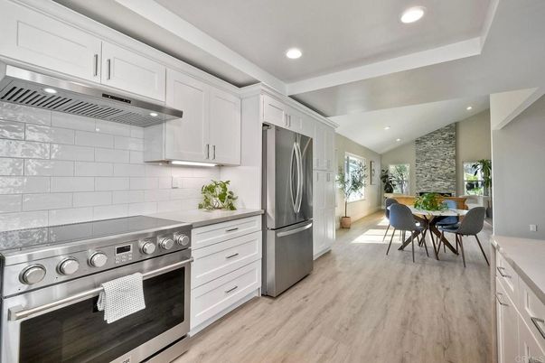 Dining room, Interior, Kitchen, Recessed Lighting, Stainless Steel Appliances, Wood Texture Flooring