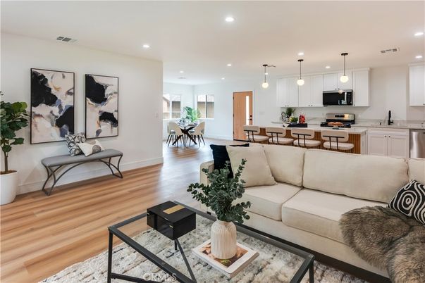 Dining room, Interior, Kitchen, Living room, Pendant Lights, Recessed Lighting, Stainless Steel Appliances, Wood Texture Flooring