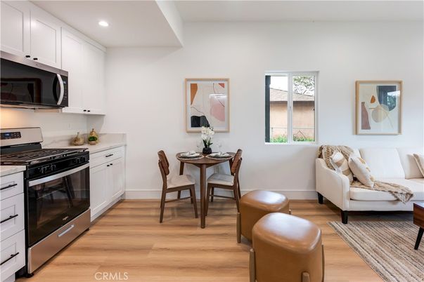Dining room, Interior, Kitchen, Recessed Lighting, Stainless Steel Appliances, Wood Texture Flooring