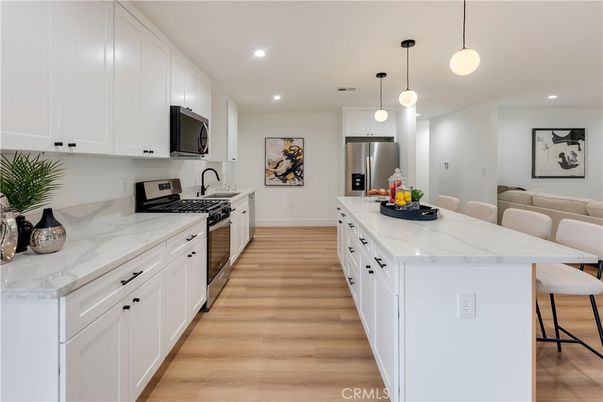 Interior, Kitchen, Pendant Lights, Recessed Lighting, Stainless Steel Appliances, Wood Texture Flooring