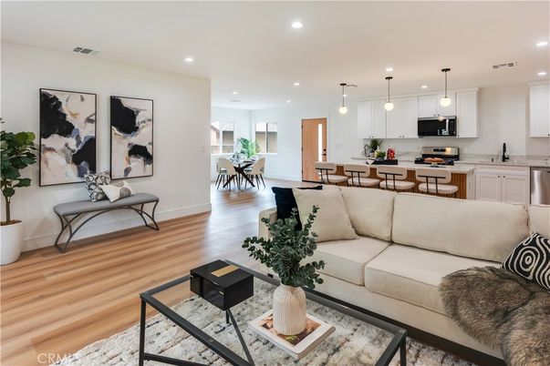 Dining room, Interior, Kitchen, Living room, Pendant Lights, Recessed Lighting, Stainless Steel Appliances, Wood Texture Flooring