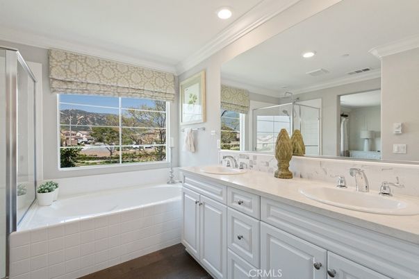 Bathroom, Dual Sink Vanities, Interior, Recessed Lighting, Wood Texture Flooring