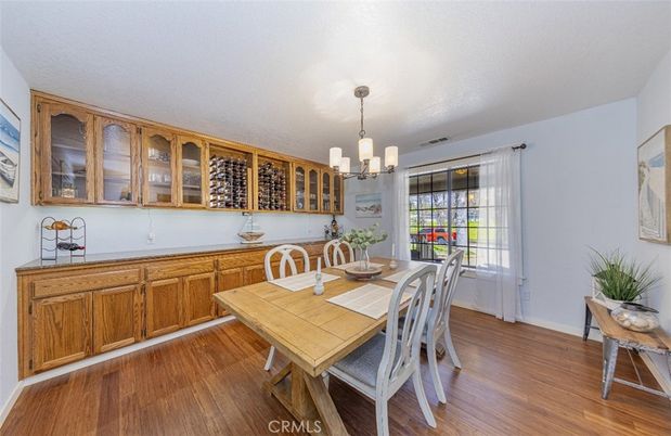 Chandelier, Dining room, Interior, Wood Texture Flooring